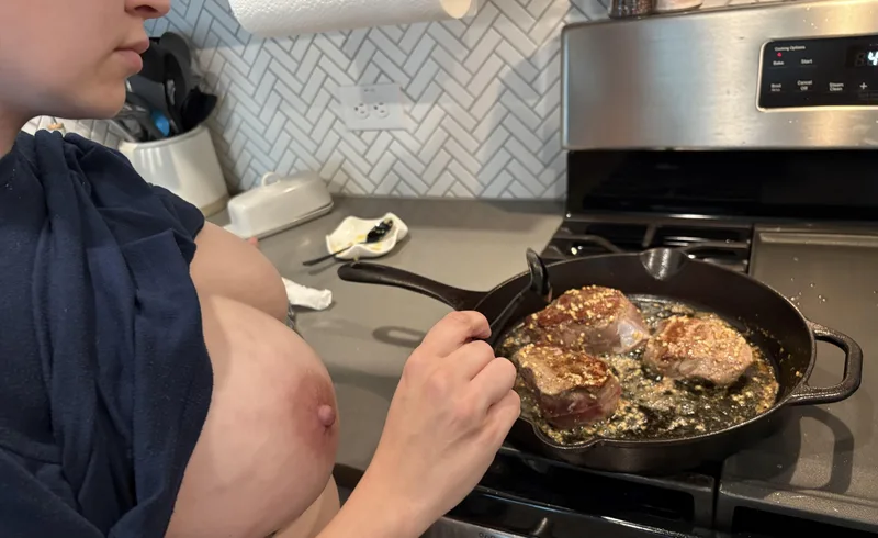 Cooking both of them a steak before we all play
