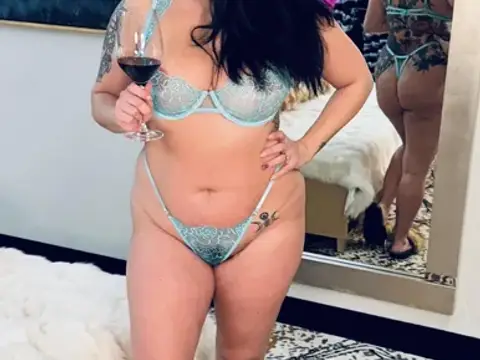A glass of wine, some see through lingerie & fuzzy slippers is the perfect recipe for a hot night.